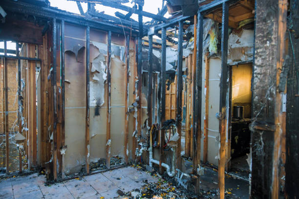 Professional Emergency Fire Damage Restoration technician working in Burtonsville, MD